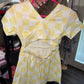 Yellow checkered crossback romper